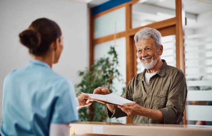 man doing insurance paperwork